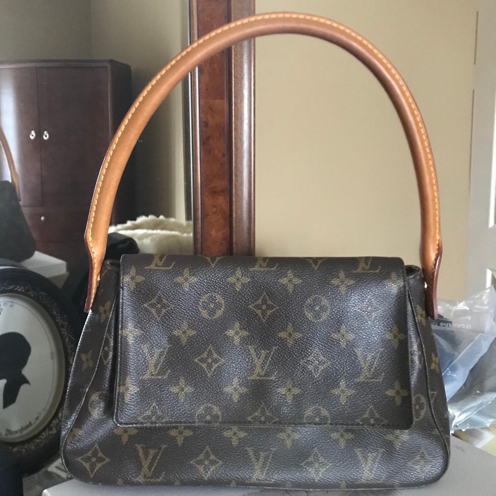 Louis Vuitton handbag with flap